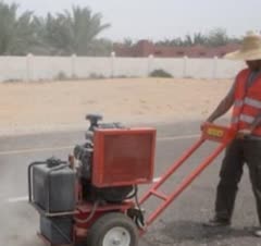 کارگر دزگیری اسفالت کاتر زن