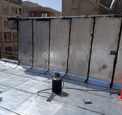 اجرای ایز‌وگام پشت بام و دیوار