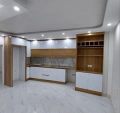 اجرای کابینت مدرن با رنگ چوب و ترکیبی