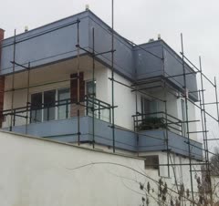 رنگ‌آمیزی نما ی سیمانی