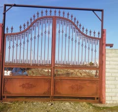 رنگ‌آمیزی درب ورودی شهرک باران