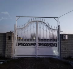 رنگ‌آمیزی درب ورودی شهرک باران