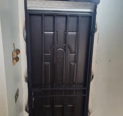 نمونه نصب شده حفاظ درب واحد مسکونی